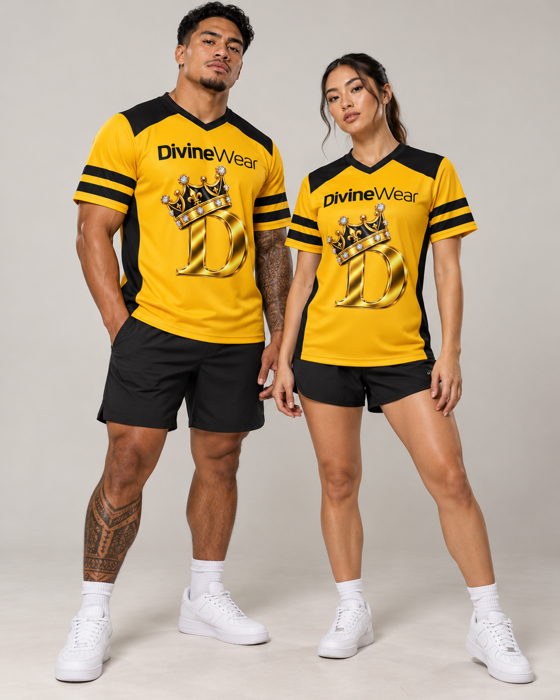 Athletic male and female models wearing the DivineWear Crown-D Gold & Black Sports Jersey