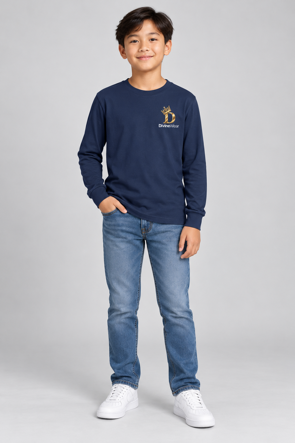 Asian American youth model wearing the navy DivineWear crown long sleeve tee