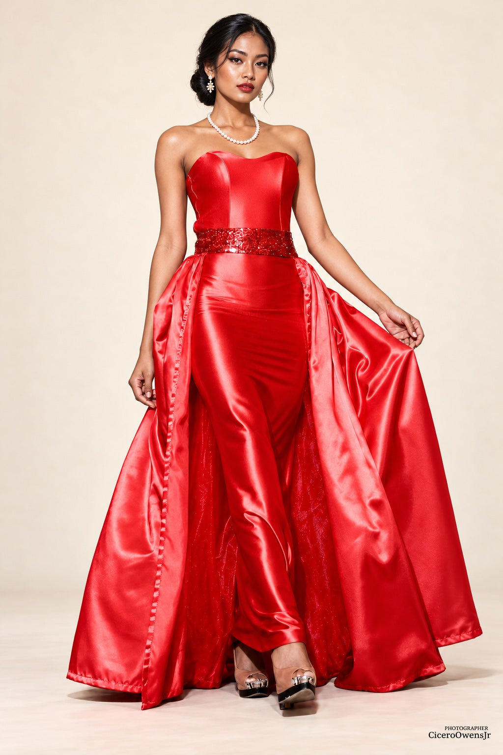 DivineWear strapless red satin gown with sequin waistband and flowing overskirt