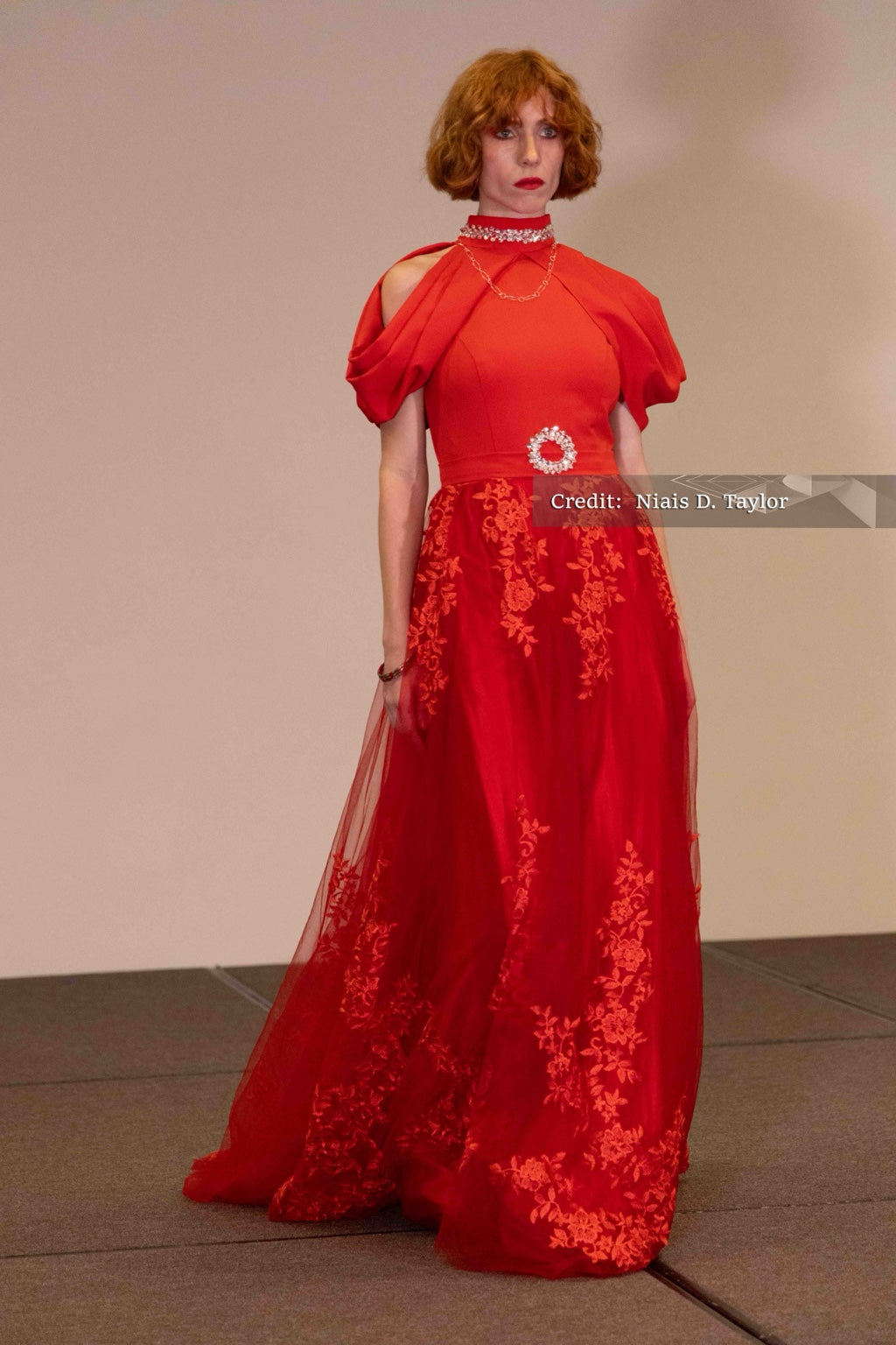 DivineWear scarlet draped gown on original runway model