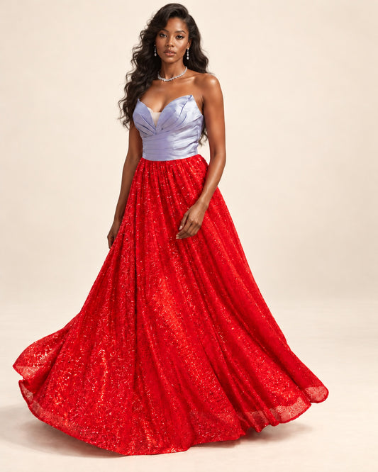 Strapless silver satin bodice with sculptural pleats and a flowing red sequin skirt