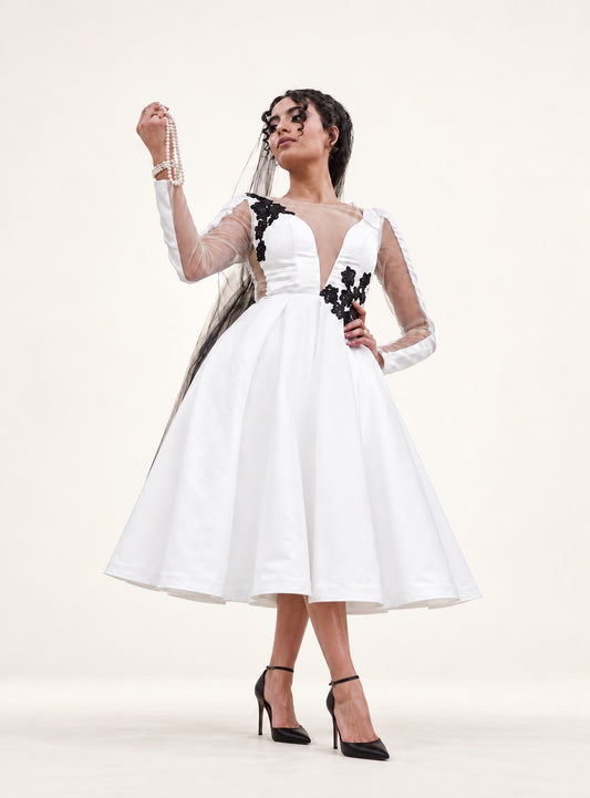 DivineWear white and black floral tea-length dress on original model