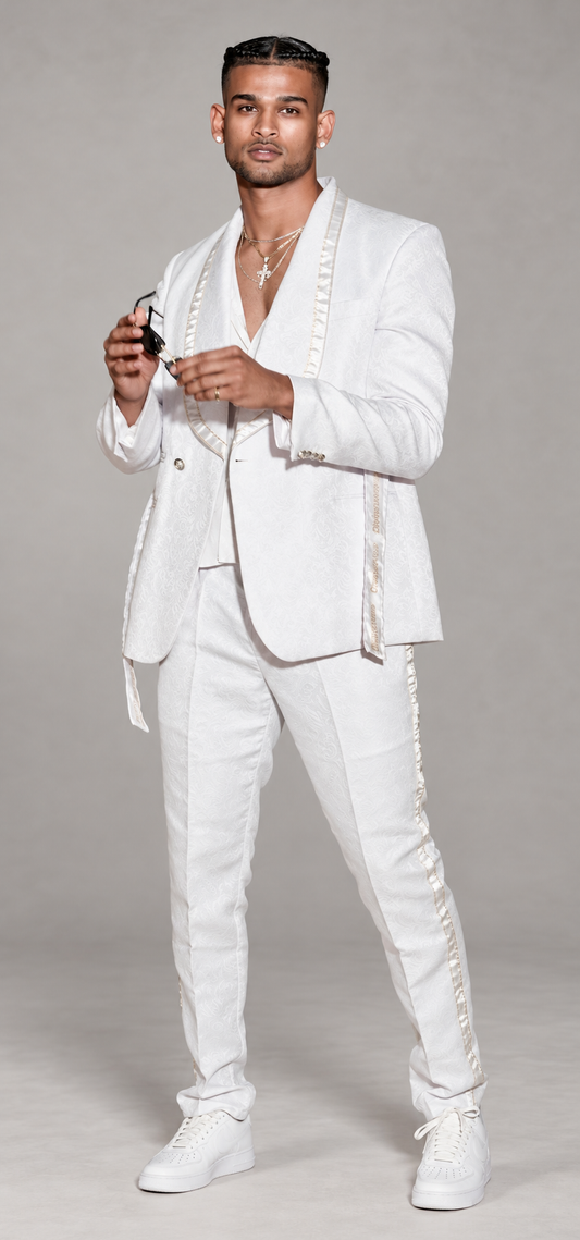 DivineWear white ribbon-trim runway suit on the original male model in a clean studio setting