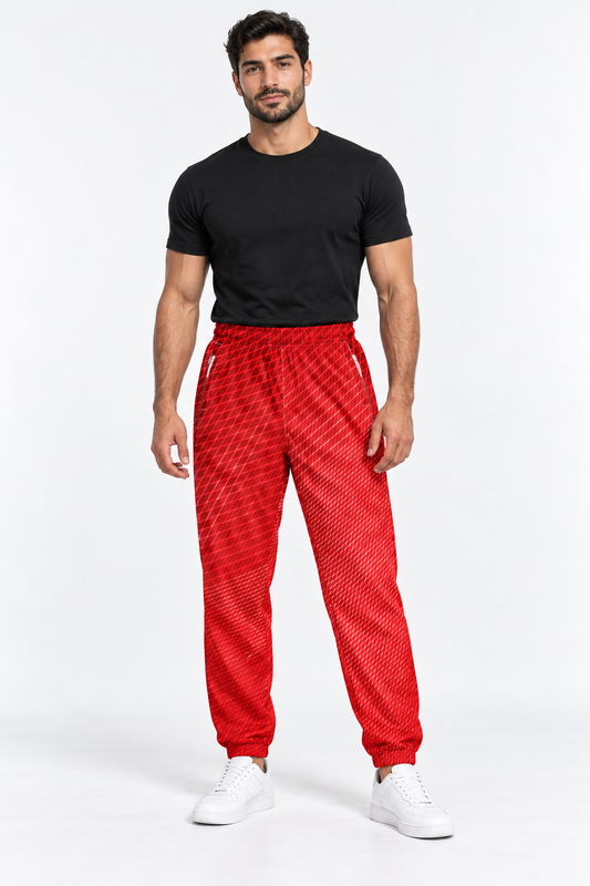 Turkish male model wearing DivineWear Ruby Red mens track pants